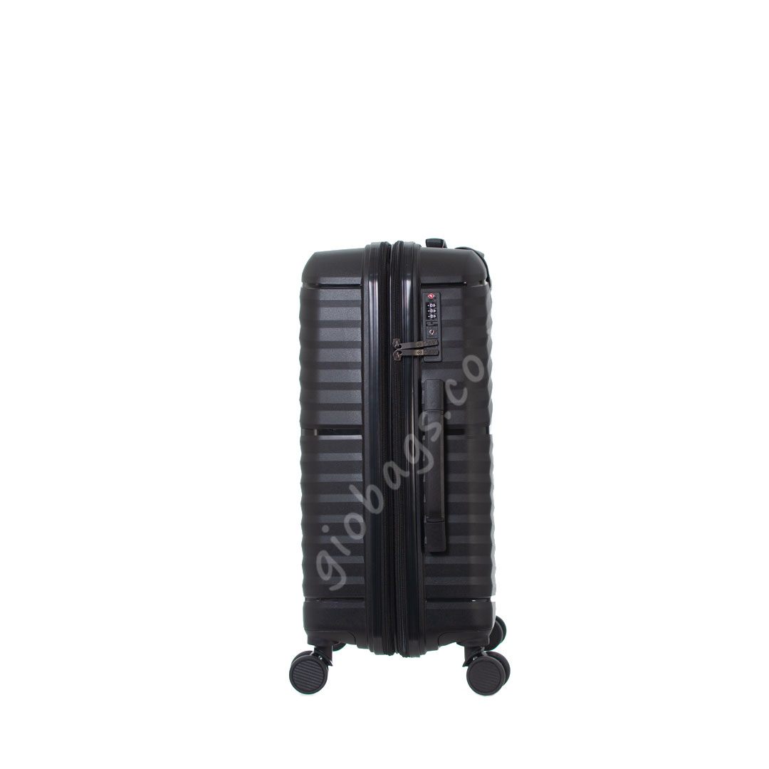 A black hard shell trolley suitcase with wheels and extendable handle, isolated on a white background.