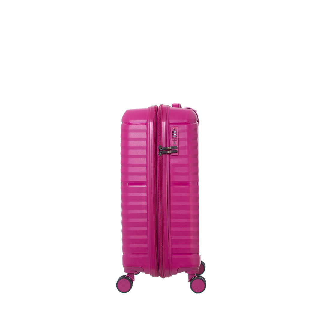 A bright pink hard-shell suitcase with wheels standing against a white background.