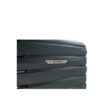 Detailed view of a sleek luggage design featuring a metallic logo and textured surface.