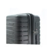 Close-up view of a sleek black suitcase featuring a textured surface and an integrated combination lock.