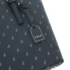 Close-up of the POLO luggage tag and signature Iconic monogram pattern on the POLO Medium Tote Bag.